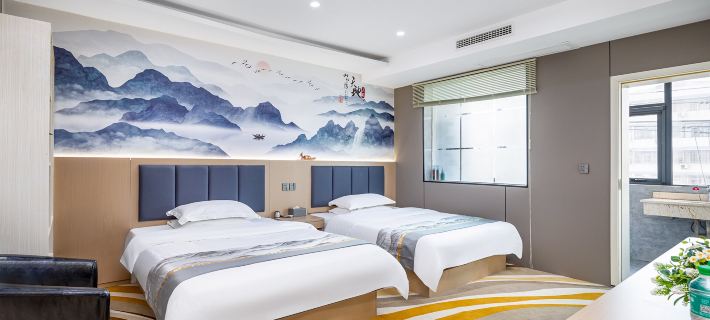Xinmi Golden Triangle Business Hotel (Zhongqiang Light Year City Plaza) Hotel di Xinmi