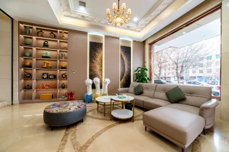 Pudun Business Hotel (Linyi) Отели в г. Линьи