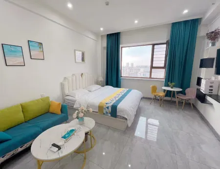 Xingang Serviced Apartment (Meihekou) Отели рядом с достопримечательностью «Northeast All Day Mall»