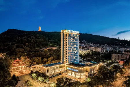 Stone Forest International Hotel Отели в г. Цюйцзин