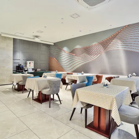 New Century Jiaxin Manju Hotel