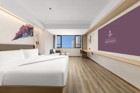 ELong Hotel (HaiKou International Trade Center Store) Отели рядом с достопримечательностью «Hainan University(Haidian Campus)»