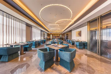 Nanchang West Station National Sports Center Orange Crystal Отели рядом с достопримечательностью «Jiangxi Science and Technology Normal University (Hongjiaozhou Campus)»