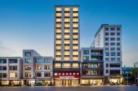 Guijia Business Hotel (Zhanjiang Wuchuan Airport)