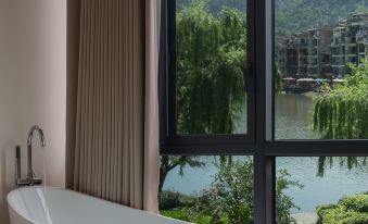 Shanshanli RiverView Design Residence (Zhenyuan Ancient City New Bridge Store)