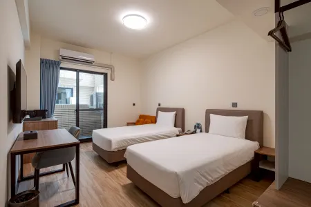 Water Woods Inn Отели рядом с достопримечательностью «Qiming Tang»