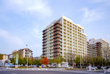 YuanYang Seatopia Xixi Parent-child hotel Отели рядом с достопримечательностью «Hebei Institute of International Business and Economics - Comprehensive Building»