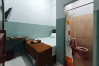 Joy Homestay Syariah, Palembang - Pensionat