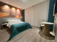 Jingmen Loulan Hotel (Xuanhua Bus Station)