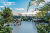 Xinli Business Hotel Hotels near Frontier Pearl