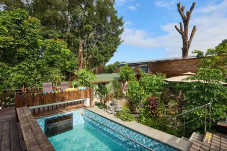 Floral Hotel·Lower Tulou hot spring Hotel Отели рядом с достопримечательностью «Tong'an Library»