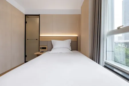 Bohu Fashion Hotel Отели рядом с достопримечательностью «Fudan University Handan Road Stadium»