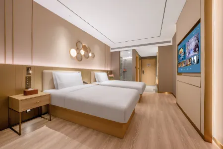 Orange Hotel (Chengdu Yipin Tianxia Jinsha Site Museum Branch) Отели рядом с достопримечательностью «Сычуаньский Университет педагогического Экспериментального Иностранного Языка (Западный Ка»