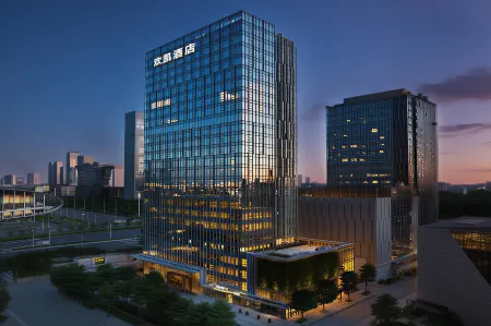 Huankai Hotel (Pazhou International Exhibition Center) Отели рядом с достопримечательностью «Shuiyue Temple (West to Guangzhou Municipal Facility Cashier Zhongshan Avenue Charging Station)»