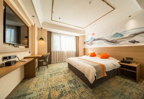Weige Hotel (Daqing East Station Xingyao Tiandi Life Center)