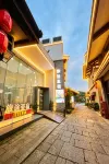 Lvtu Yasu Holiday Hotel (Wentang Gujing Spring Street Branch) Hotel di 