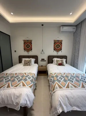 Jiansuli Homestay, Yining City - navetta aeroportuale