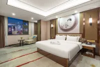 Xinyi Hotel Отели рядом с достопримечательностью «Универмаг Кошапо»