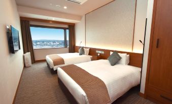 Odysis Suites Osaka Airport Hotel
