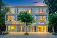 Xishuangbanna Yungui inn Hotell i 