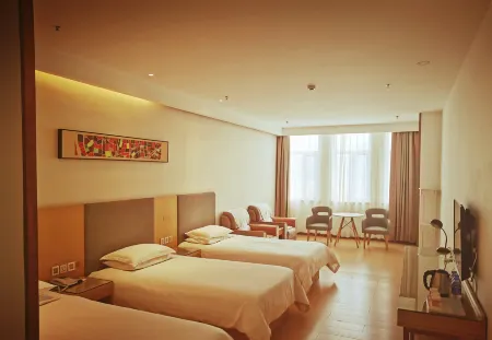 Home Inn Huaxuan Collection Hotel (Guyuan Qinghe South Road) Отели рядом с достопримечательностью «The Guyuan Museum of Ningxia»