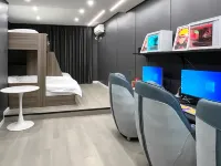 HG E-sports Hotel Отели в г. Downtown