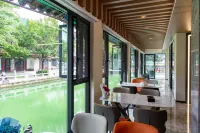 Chuxiong Qile Homestay (Yi Ancient Town) - โรงแรมราคาถูก