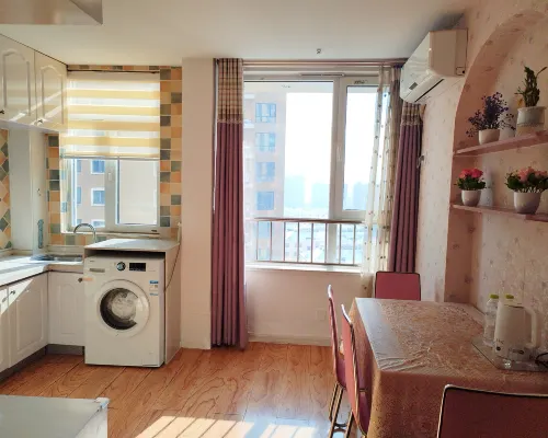 Qingyun Boutique Vacation Apartment (Weihai High-Speed Railway Station Hanlefang) Zimmer Photos
