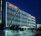 華策美洲酒店（深圳龍崗雙龍地鐵站店） 鄰近王斌裝飾全屋定製（百富城KTV店）的酒店