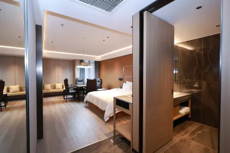 Walton International Hotel (Ganzhou Xinfeng Station Branch) Отели рядом с достопримечательностью «Chenyi Square»