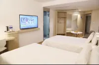 Guzhen Romantic Journey Hotel (Touzhi Building) Hotels in Guzhen