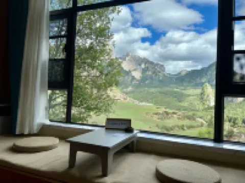 Lotus Forget-Worry Lodge · Facing Main Peak with Sunrise View (Zagana Scenic Area Branch)