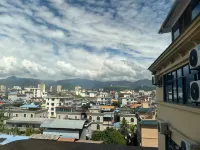 DO A LAND v Hotel Dehong Mangshi Airport Branch - Mountain view