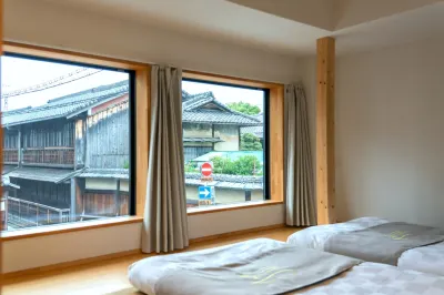 NEW!  5 minutes from JR Tambaguchi Station, Modern Japanese Style, Beautiful 2 Floor Townhouse Hotels in 
