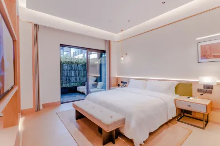 Zhonglu Hotel (Donglin Ancient Town) Отели рядом с достопримечательностью «Lushan Taohuayuan Scenic Area»