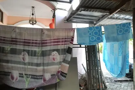 Kost 48 Surabaya Отели в г. Sambikerep