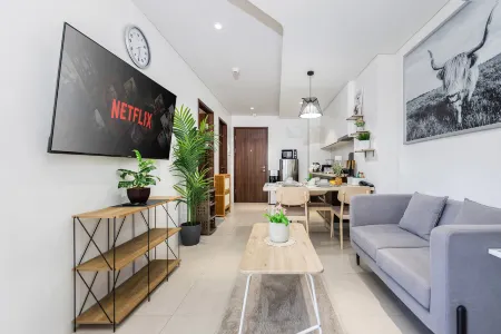 Dominiks spacious family 1 Bedroom 47sqm Tambuli Pool Balcony up to 6 People Отели рядом с достопримечательностью «Мактан»