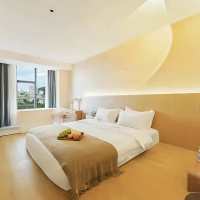 M Miyue Design Hotel (Huaxi Park Subway Station) Hotels near Flower Stream Park