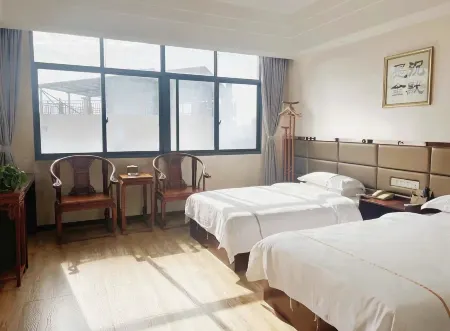 Zhuyuan Village Business Hotel Отели рядом с достопримечательностью «Hunan Nuanshui Hot Spring Resort»