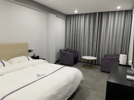 Roma Theme Hotel Отели рядом с достопримечательностью «Wanzai Ancient City»