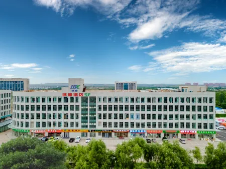 Ordos Mukang Hotel Отели рядом с достопримечательностью «Mengguxiangqi Square»
