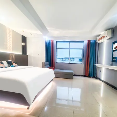 Shangqingcheng Smart Hotel (Qionghai Bus Station Yinlongcheng Branch)