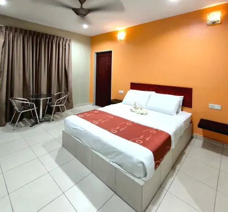 Hotel O Rumah Rehat Awana Отели рядом с достопримечательностью «Парк Аспен Вижен Сити Сентрал»