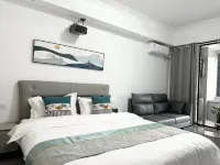 智美·輕居影音民宿（駐馬店高鐵西站凱旋廣場店）