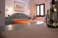 Residence Cala Viola Hotels in Orosei