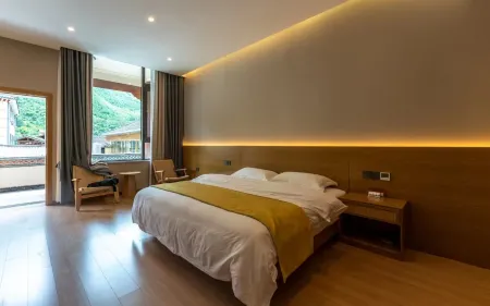 Weixi Gadan Fanyin Homestay (Tacheng Cultural Square Store) Отели рядом с достопримечательностью «Damo Patriarch Cave»