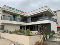 Qiaoyuan Yueshe Boutique Homestay (Southeast Asia Style Park) Отели рядом с достопримечательностью «Село Пхеньянь»