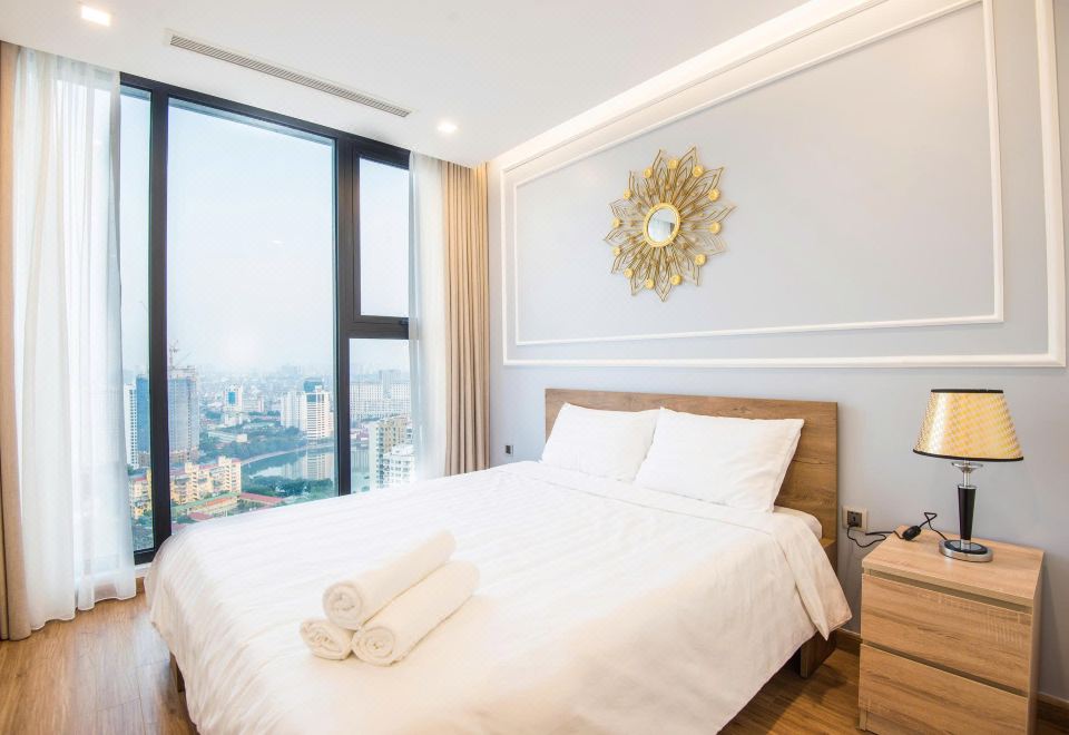 빈홈 메트로폴리스 아파트먼트의 모던한 객실 내부 이미지