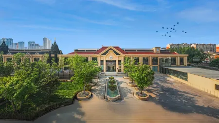 Harbin Songbei Sunac Mall Manxin Hotel Отели рядом с достопримечательностью «Heilongjiang Infotech Profession College (Xueyuan Road)»