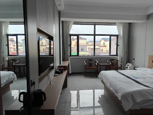 Yunduan Xiaochengju Business Hotel - parking